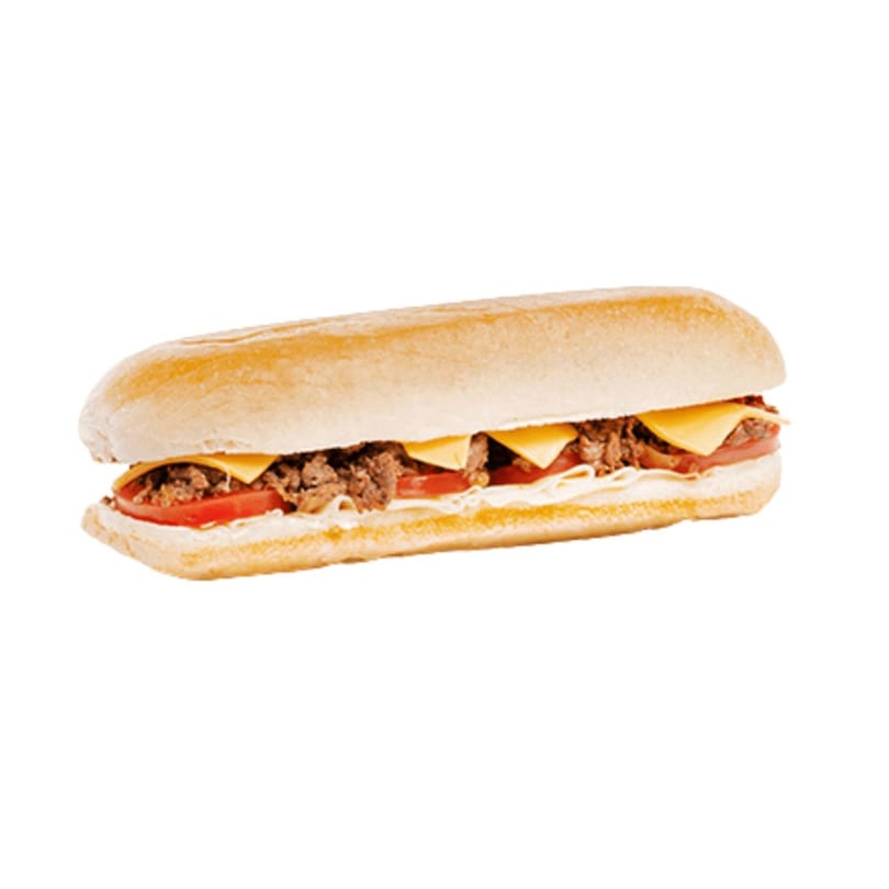 A Banana King cheesesteak sandwich with meat, melted cheese, and tomatoes on a white background.