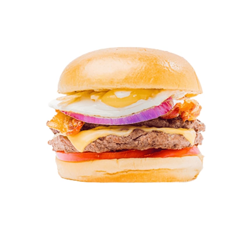 A Banana King burger with two patties, cheese, bacon, red onion, tomato, and a fried egg.