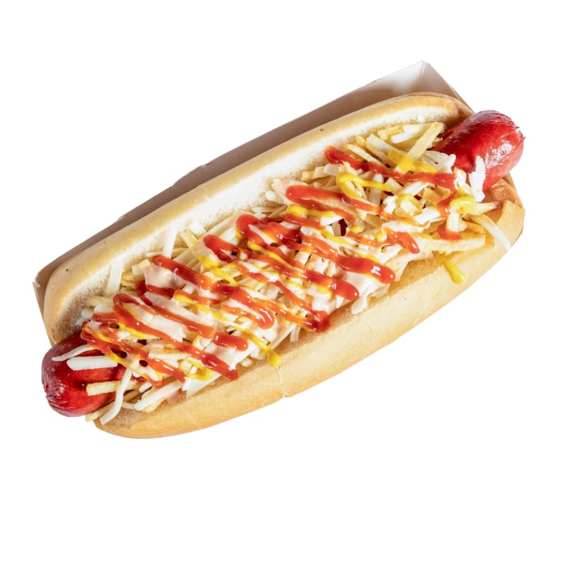 A Banana King hot dog with ketchup, mustard, mayonnaise, and potato sticks in a paper tray.