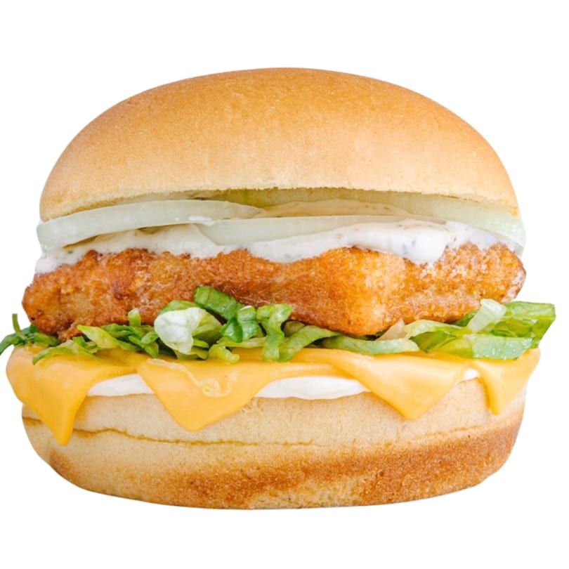 A Banana King fish sandwich with cheese, lettuce, onions, and tartar sauce on a bun.
