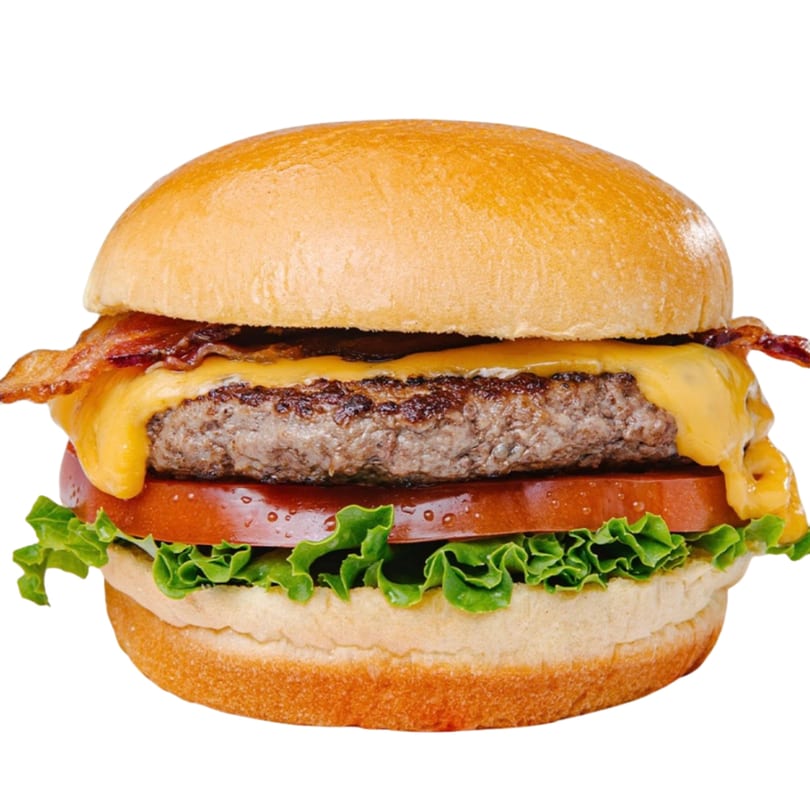 A Banana King bacon cheeseburger with melted cheese, tomato, and lettuce on a bun.
